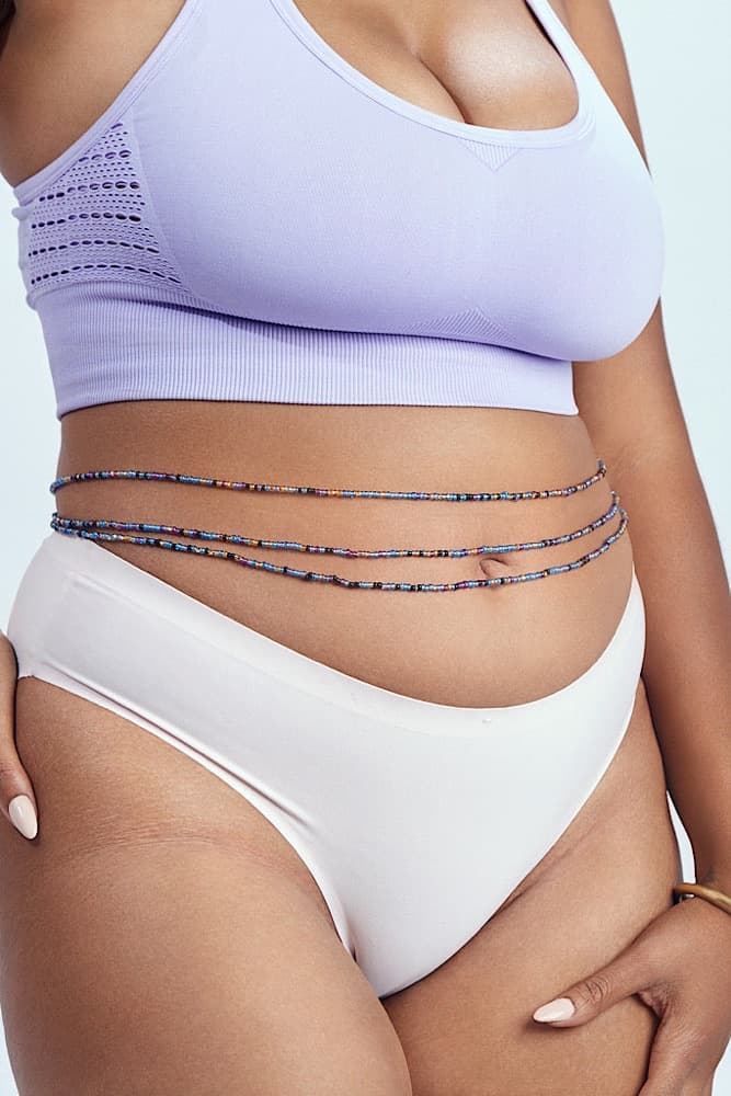 Layered waist beads worn